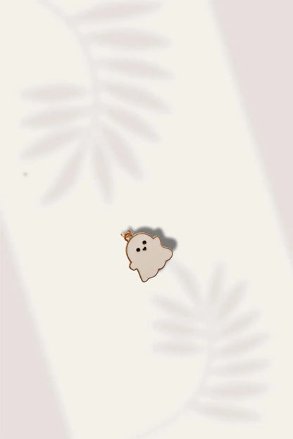 Third view of a charm featuring a cute white spooky adorable ghost design.
