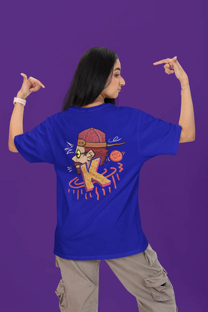 Back view of a female model wearing a royal blue oversized t-shirt featuring the Hindi word for "cool" with a unique, playful design.