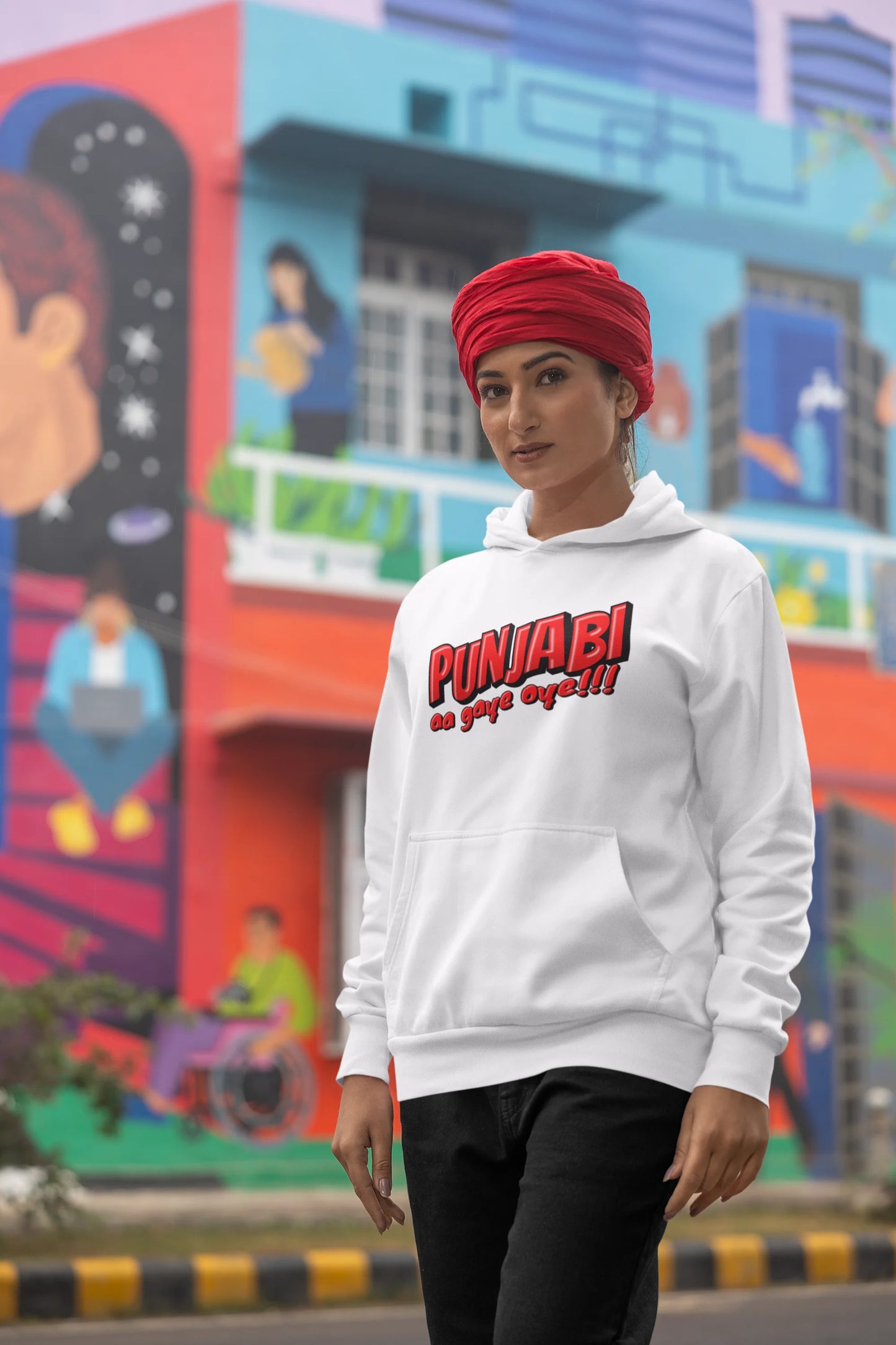 Fifth front view of a female model wearing an off-white hoodie with the text "Punjabi Aa Gaye".