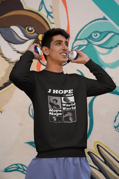 Second front view of a male model wearing a black sweatshirt featuring a vibrant design inspired by BTS member J-Hope (Hoseok). Ideal for BTS fans (ARMY) and K-Pop enthusiasts who love dance and rap-focused music.