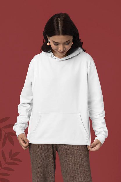 First front view of a female model wearing a white hoodie with a heron taking off under the moonlight.