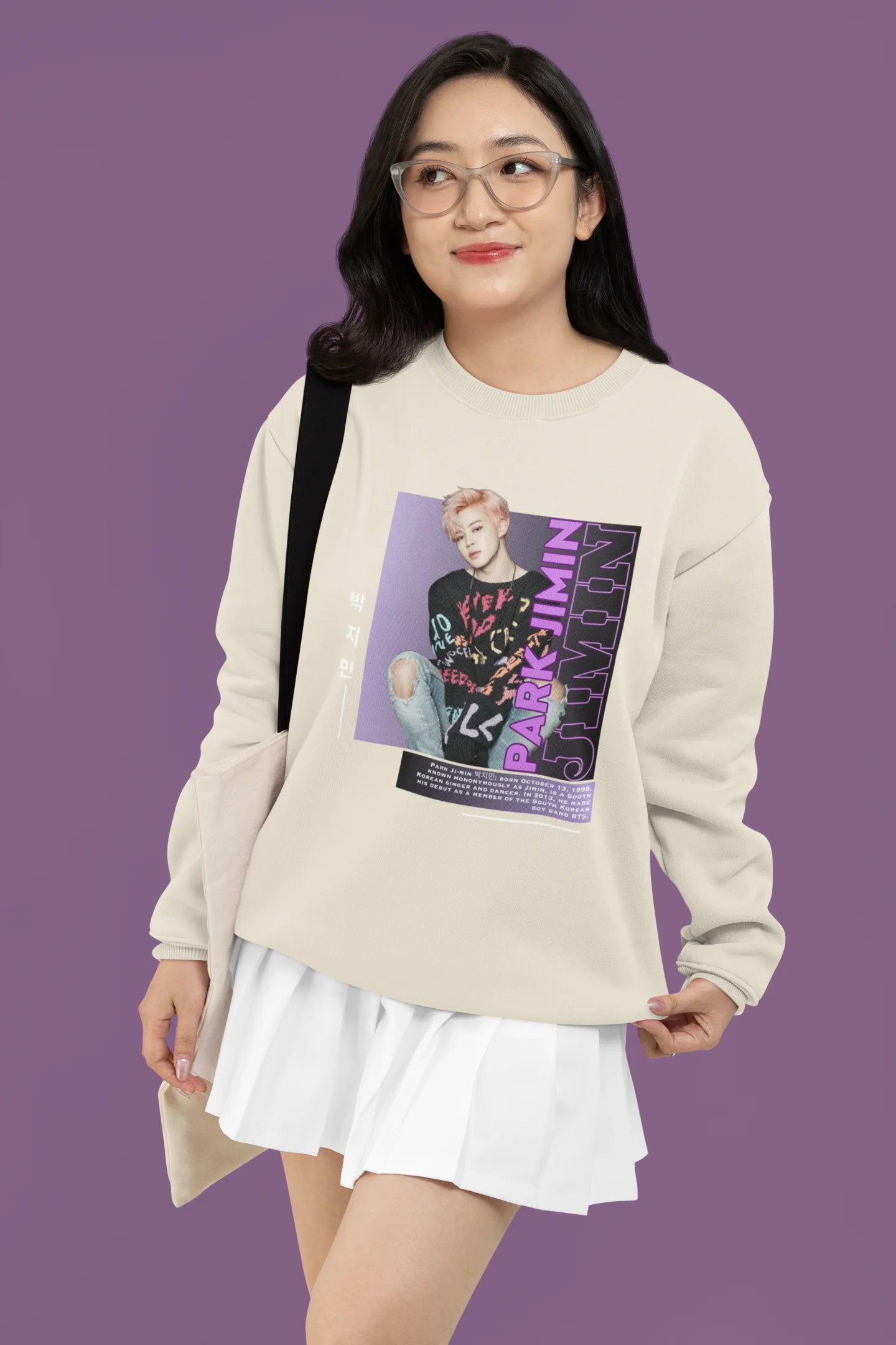 First front view of female model wearing a cream sweat shirt featuring a bold design inspired by BTS member Park Jimin (Jimin). Ideal for BTS fans (ARMY) and K-Pop enthusiasts who love dance-focused music.