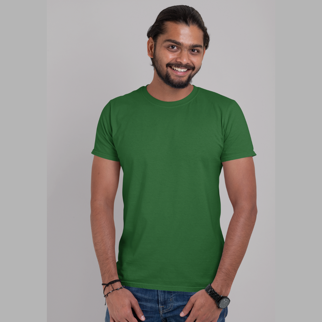 Front view of a male model wearing a bottle green oversized, premium quality, pure cotton t-shirt.
