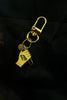 Fourth view of a keychain featuring the number thirteen, symbolizing Taylor Swift's lucky number.