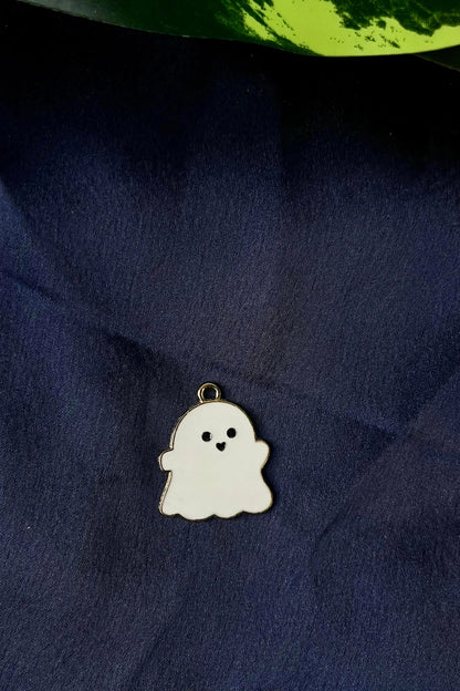 Second view of a charm featuring a cute white spooky adorable ghost design.