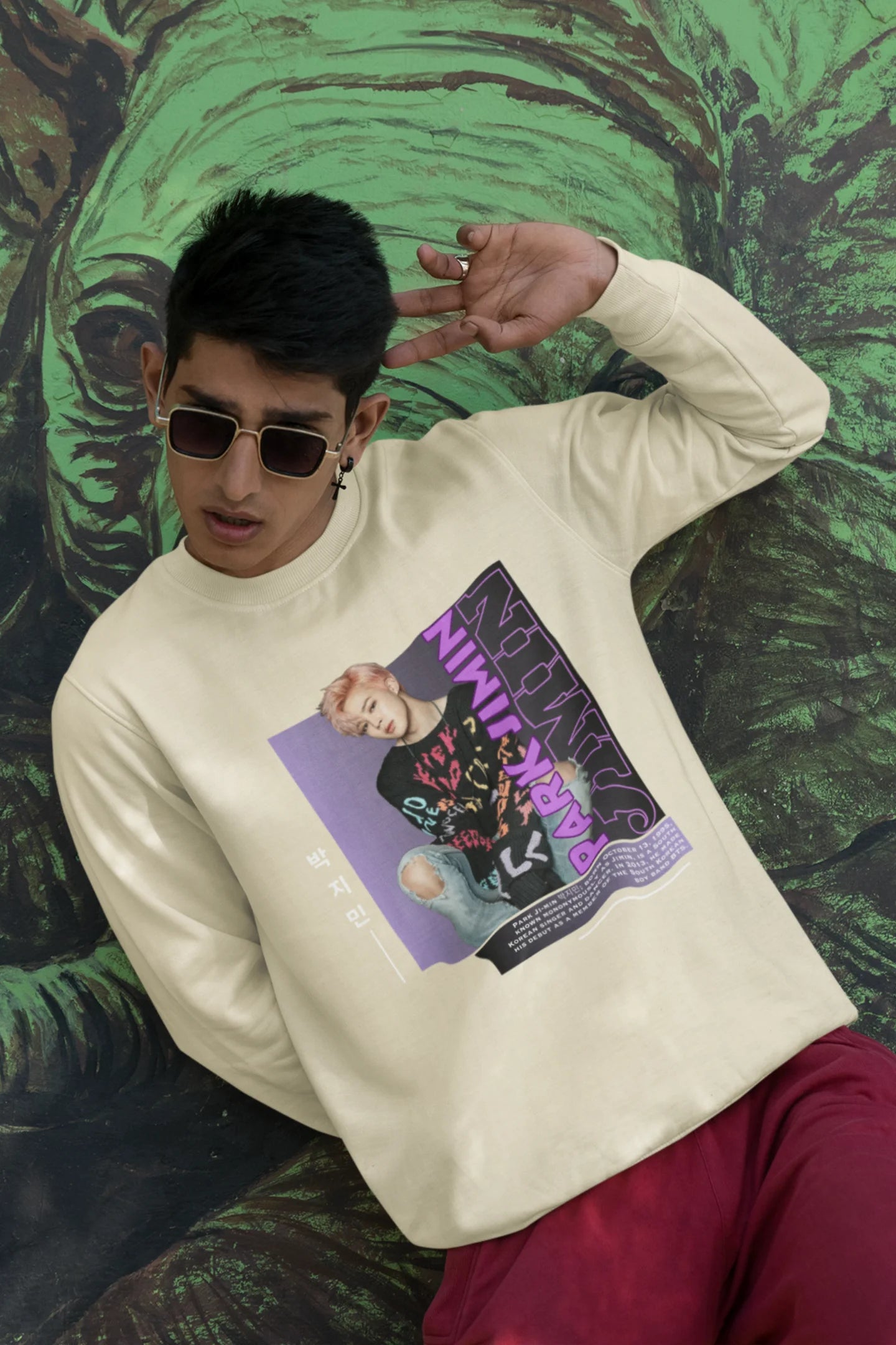 Second front view of male model wearing a cream sweat shirt featuring a bold design inspired by BTS member Park Jimin (Jimin). Ideal for BTS fans (ARMY) and K-Pop enthusiasts who love dance-focused music.