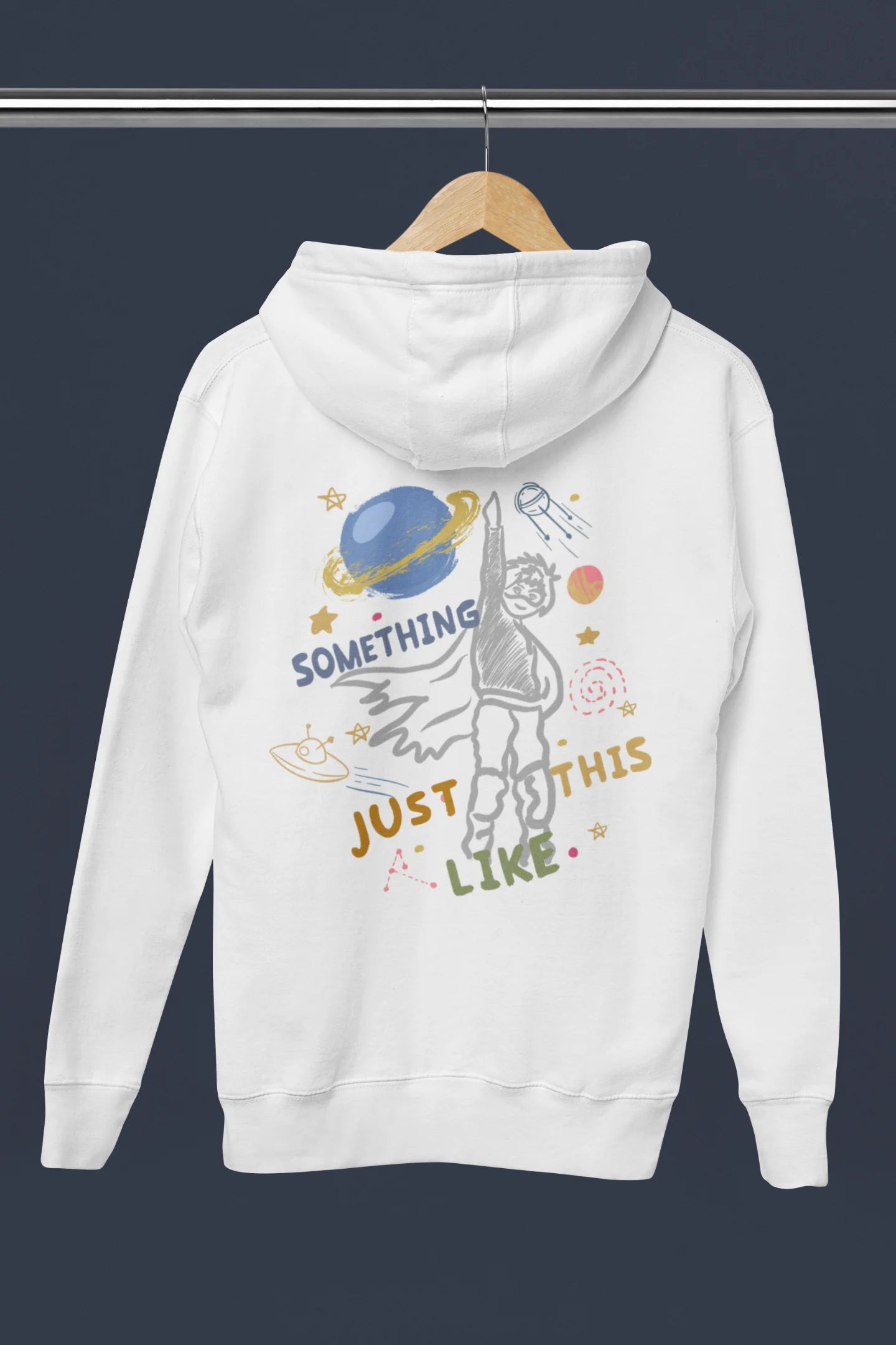 Back view of an off-white hoodie with a design inspired by the "Something Just Like This" music video, featuring the word "Superheroes".