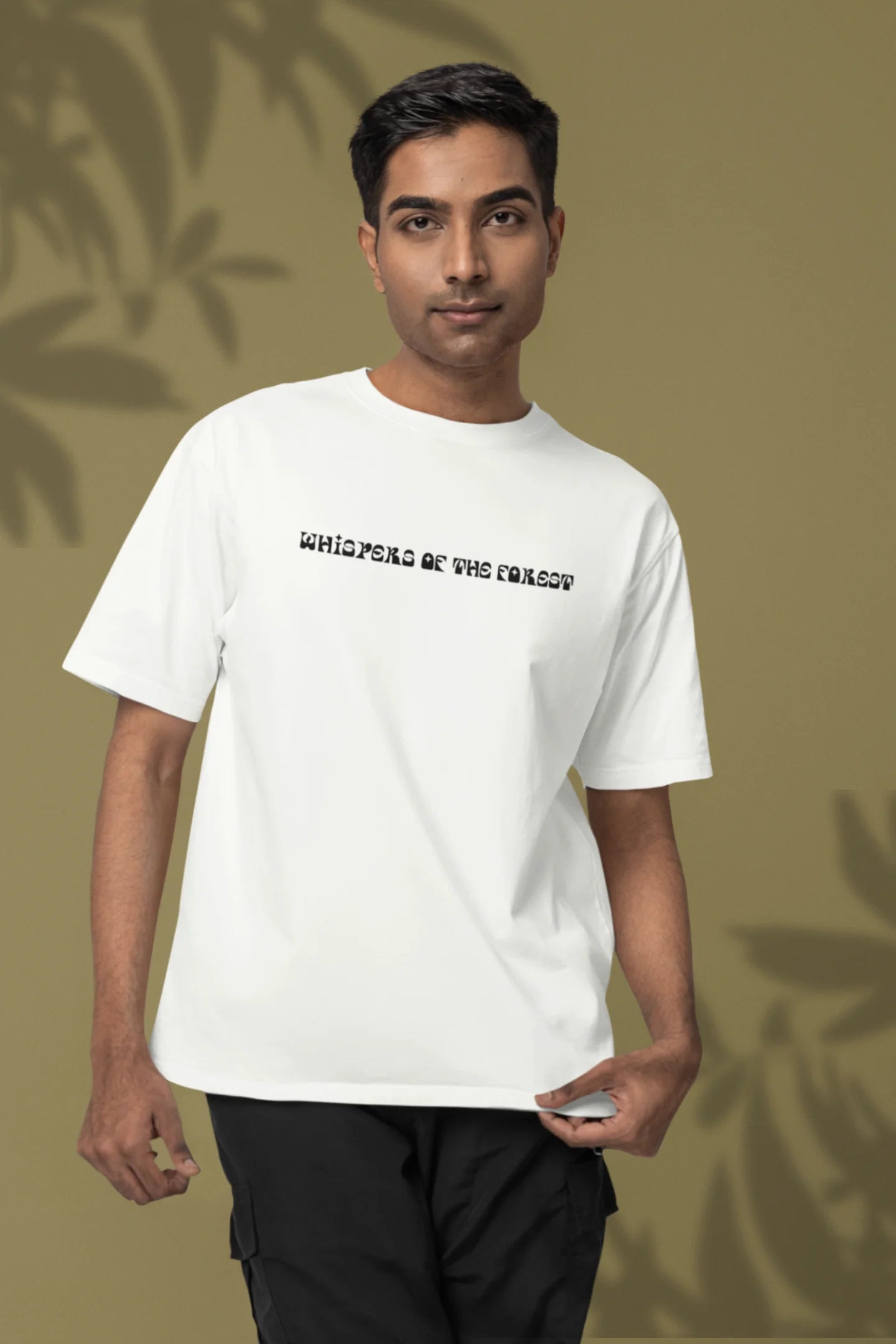First front view of a male model wearing a off-white oversized tee with a design featuring three different types of butterflies, symbolizing the beauty and diversity of nature.