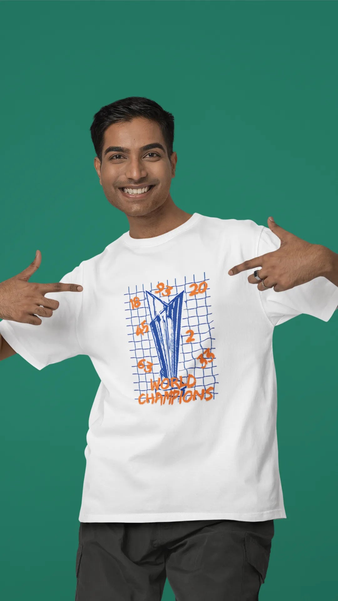 Fourth front image of male model wearing an off-white oversized t-shirt featuring the World Cup 2024 trophy with the text "World Champions" underneath. Ideal for Indian cricket fans celebrating their team's victory.