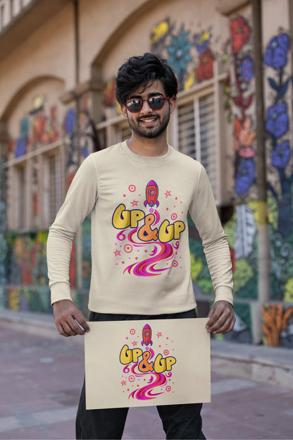 Second front view of a male model wearing an cream sweatshirt with a rocket ship design and the text "Up & Up".