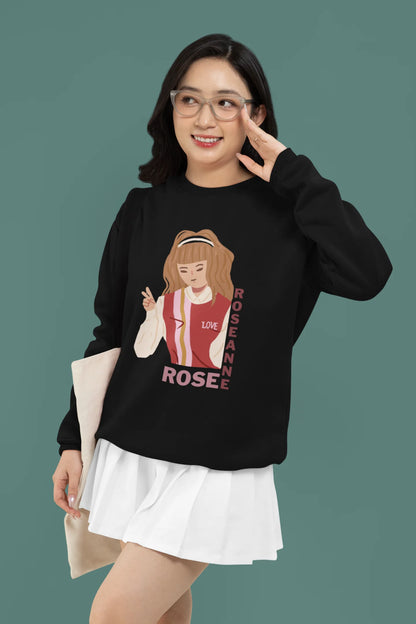 Second front view of a female model wearing a black sweatshirt featuring a stylish design inspired by Blackpink member Rosé. Ideal for fans of Rosé, Blackpink, and K-Pop music enthusiasts.