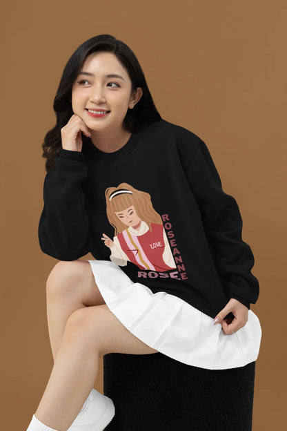 Third front view of a female model wearing a black sweatshirt featuring a stylish design inspired by Blackpink member Rosé. Ideal for fans of Rosé, Blackpink, and K-Pop music enthusiasts.