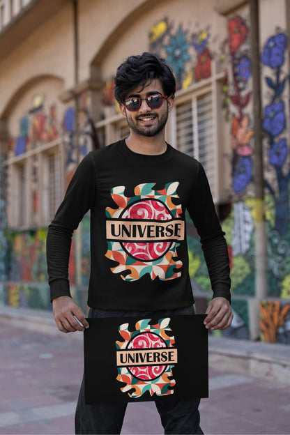 Third front view of a male model wearing an black sweatshirt with a cosmic Universe design inspired by Coldplay.