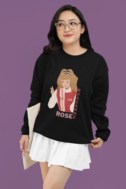 First front view of a female model wearing a black sweatshirt featuring a stylish design inspired by Blackpink member Rosé. Ideal for fans of Rosé, Blackpink, and K-Pop music enthusiasts.