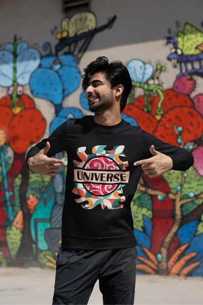 First front view of a male model wearing an black sweatshirt with a cosmic Universe design inspired by Coldplay.
