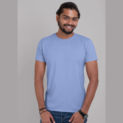 Front view of a male model wearing a sky blue oversized, premium quality, pure cotton t-shirt.