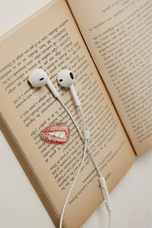 First image of an charm featuring the Taylor Swift phrase "You Owe Him Nothing" on a lip design. Perfect for all Swifties.