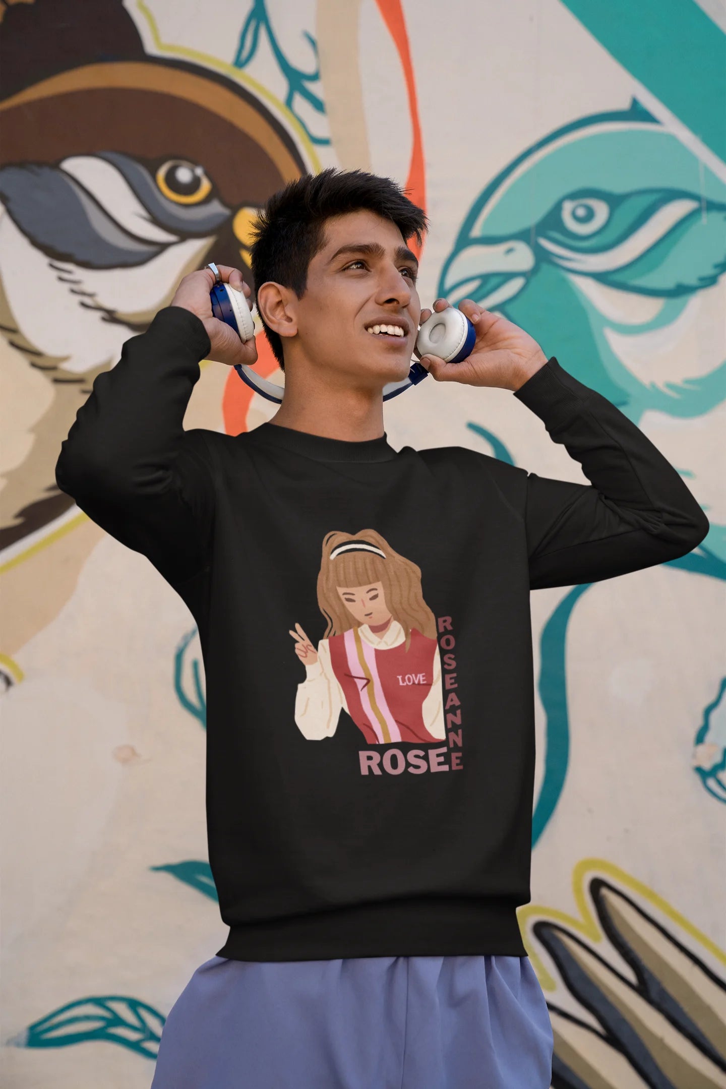 First front view of a male model wearing a black sweatshirt featuring a stylish design inspired by Blackpink member Rosé. Ideal for fans of Rosé, Blackpink, and K-Pop music enthusiasts.