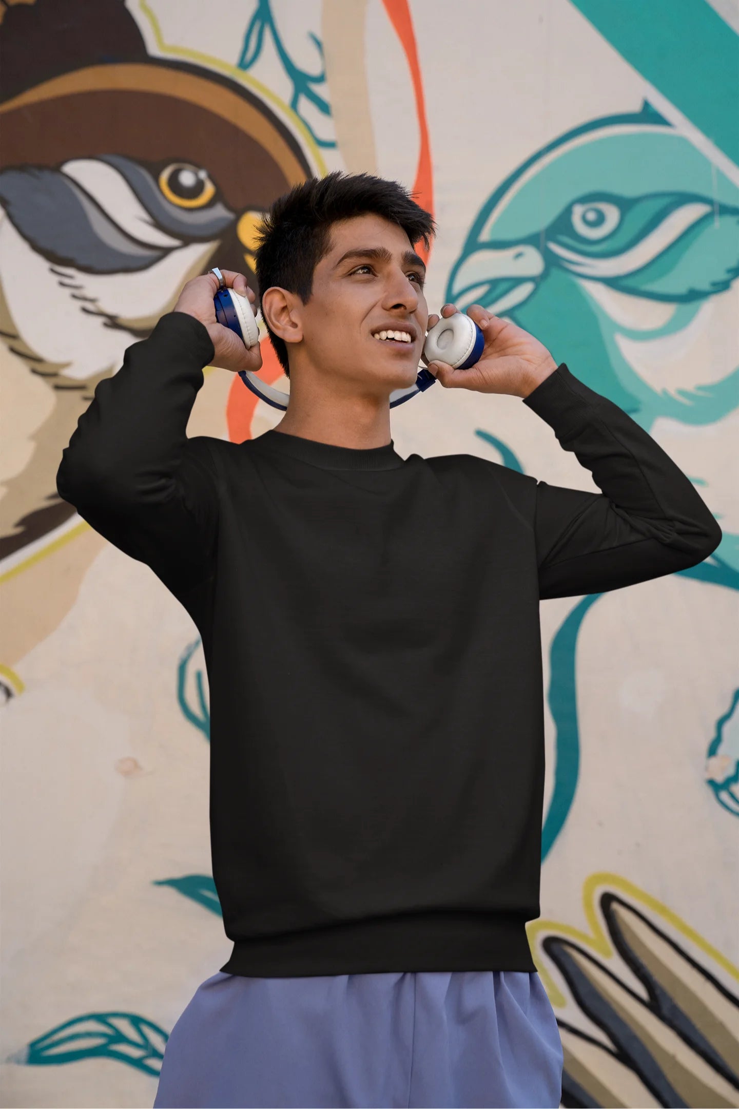 First front view of a male model wearing a black sweatshirt featuring a stylish design inspired by Blackpink member Jisoo. Ideal for Blinks (Blackpink fans) and K-Pop enthusiasts who love Korean music and fashion.