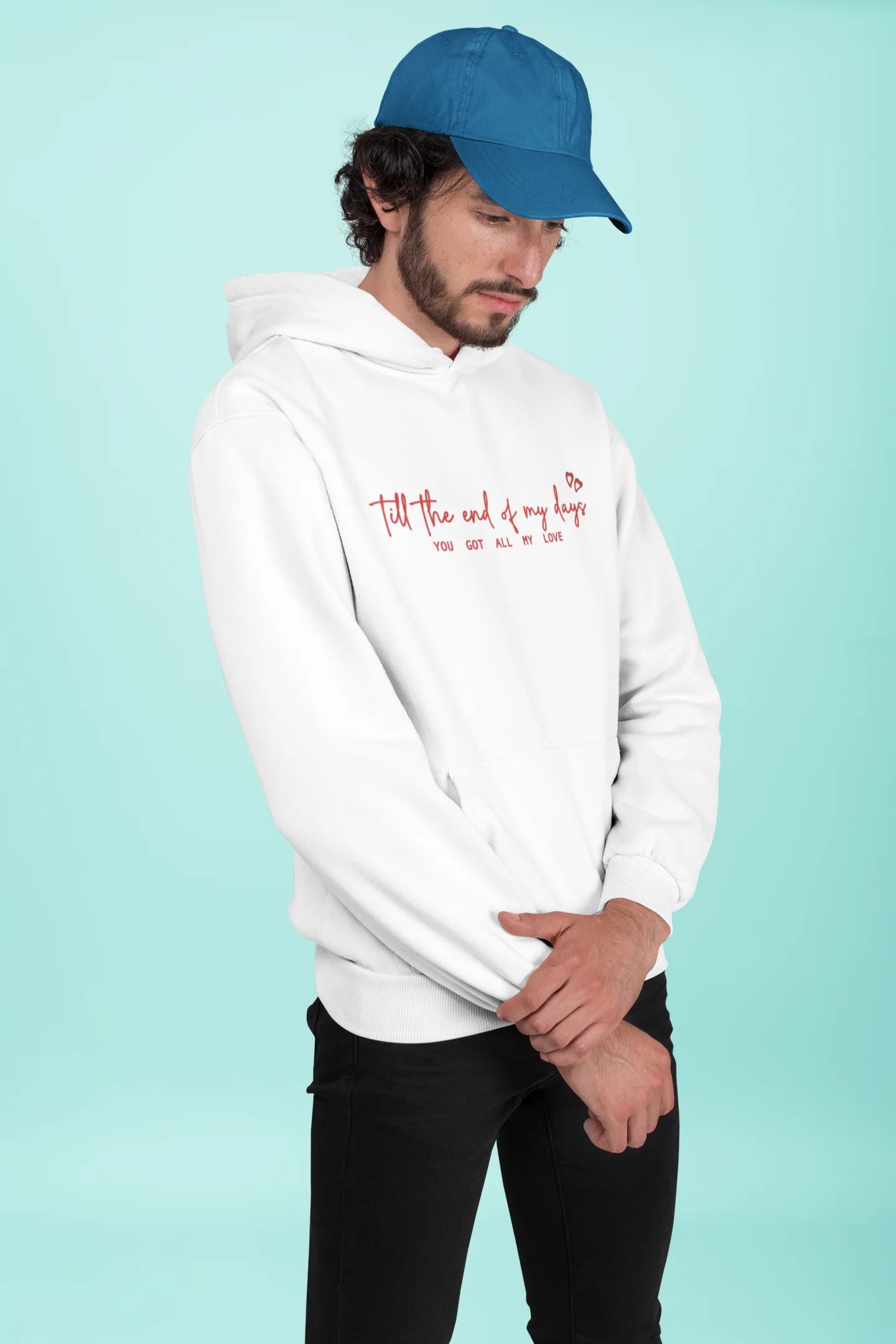 First front view of a male model wearing a off-white hoodie with a heart design and the text "All My Love".