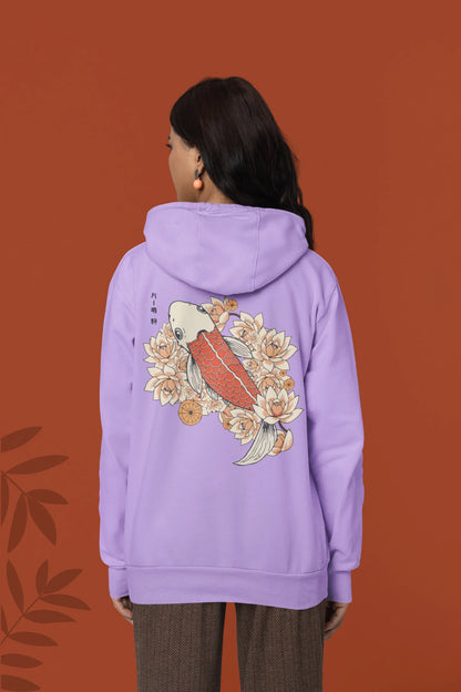 Back view of a female model wearing a lavender hoodie with a design of a koi fish swimming in a bed of flowers.