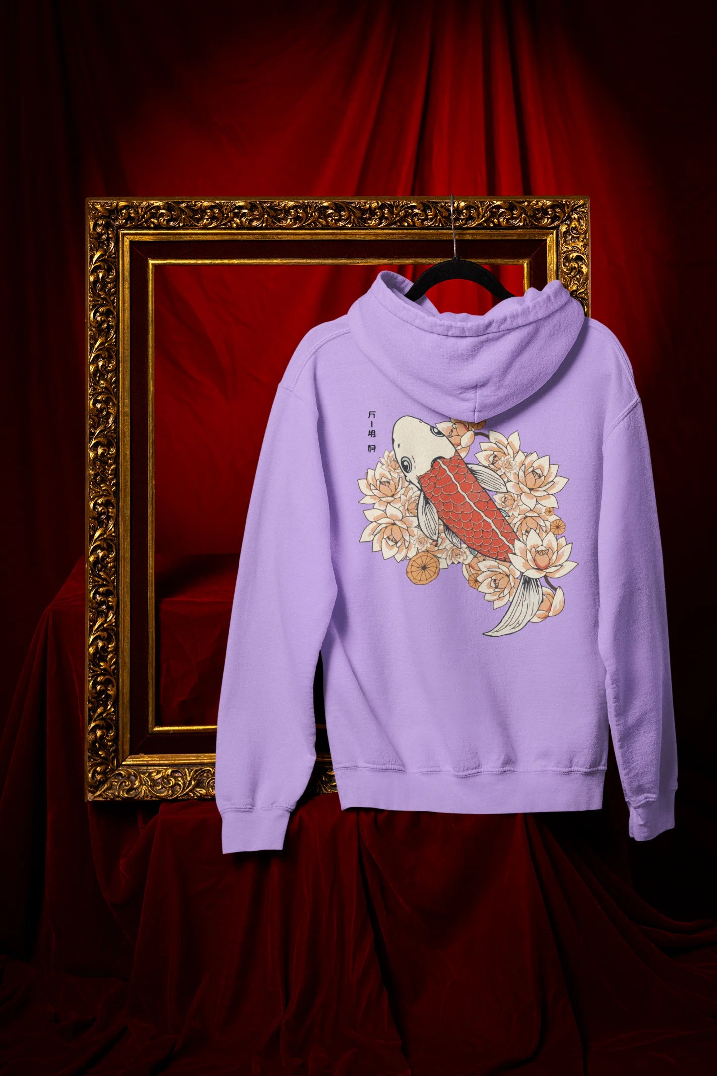 Back view of a lavender hoodie with a design of a koi fish swimming in a bed of flowers.