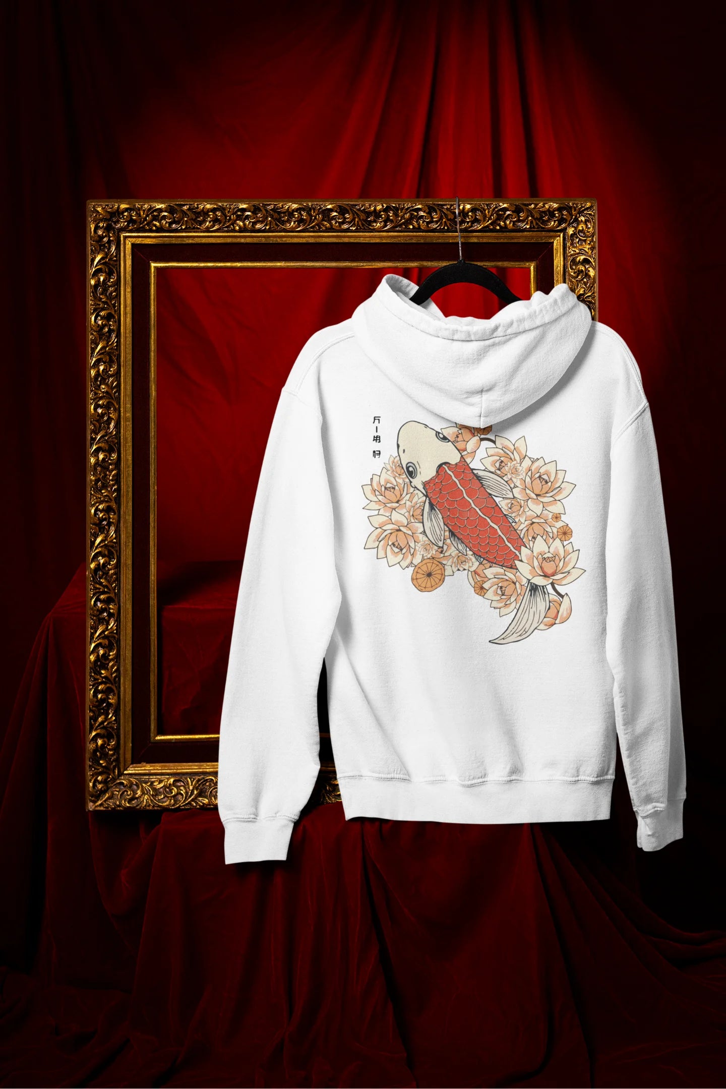Back view of a white hoodie with a design of a koi fish swimming in a bed of flowers.