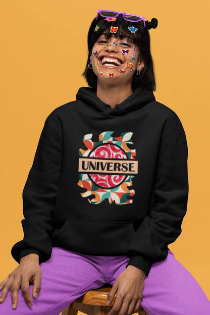 4th front view of a female model wearing an black hoodie with a cosmic Universe design inspired by Coldplay.