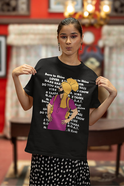 Third image of a female model wearing a black oversized t-shirt with a Diljit Dosanjh portrait on a t-shirt with his album titles written in the background.