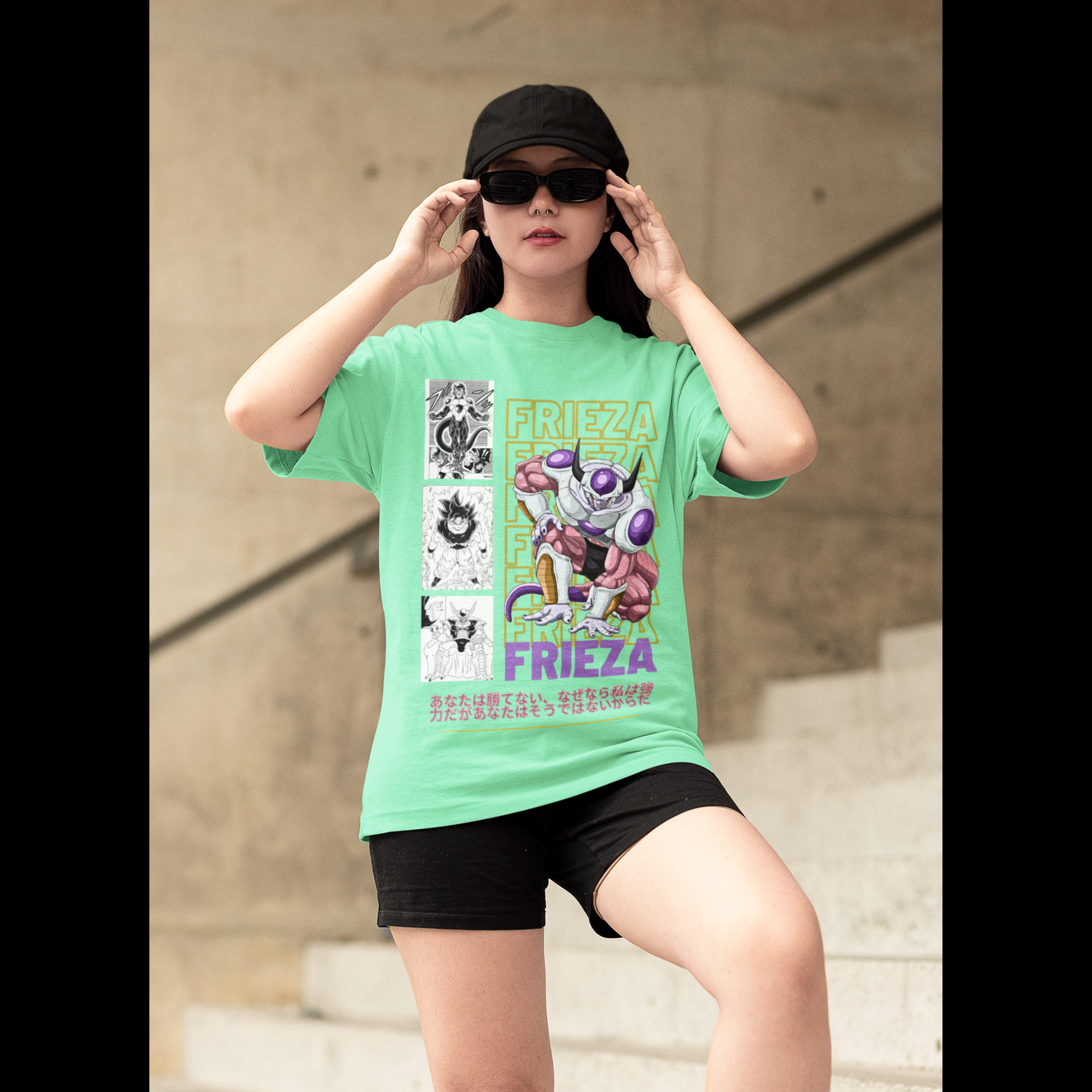 2nd front view of a female model wearing a mint green oversized t-shirt featuring Frieza from Dragon Ball Z with the text "Frieza."