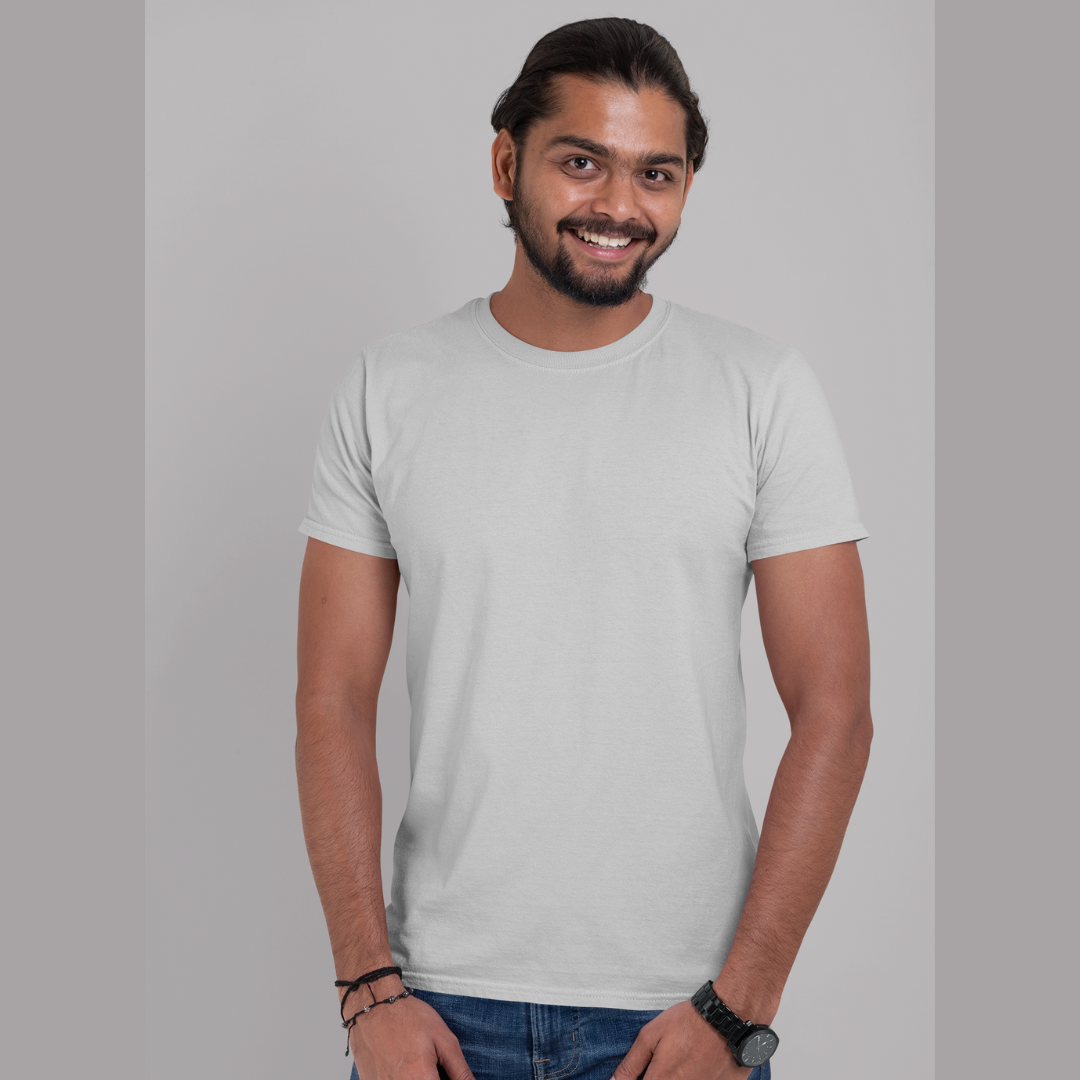 Front view of a male model wearing a grey oversized, premium quality, pure cotton t-shirt.