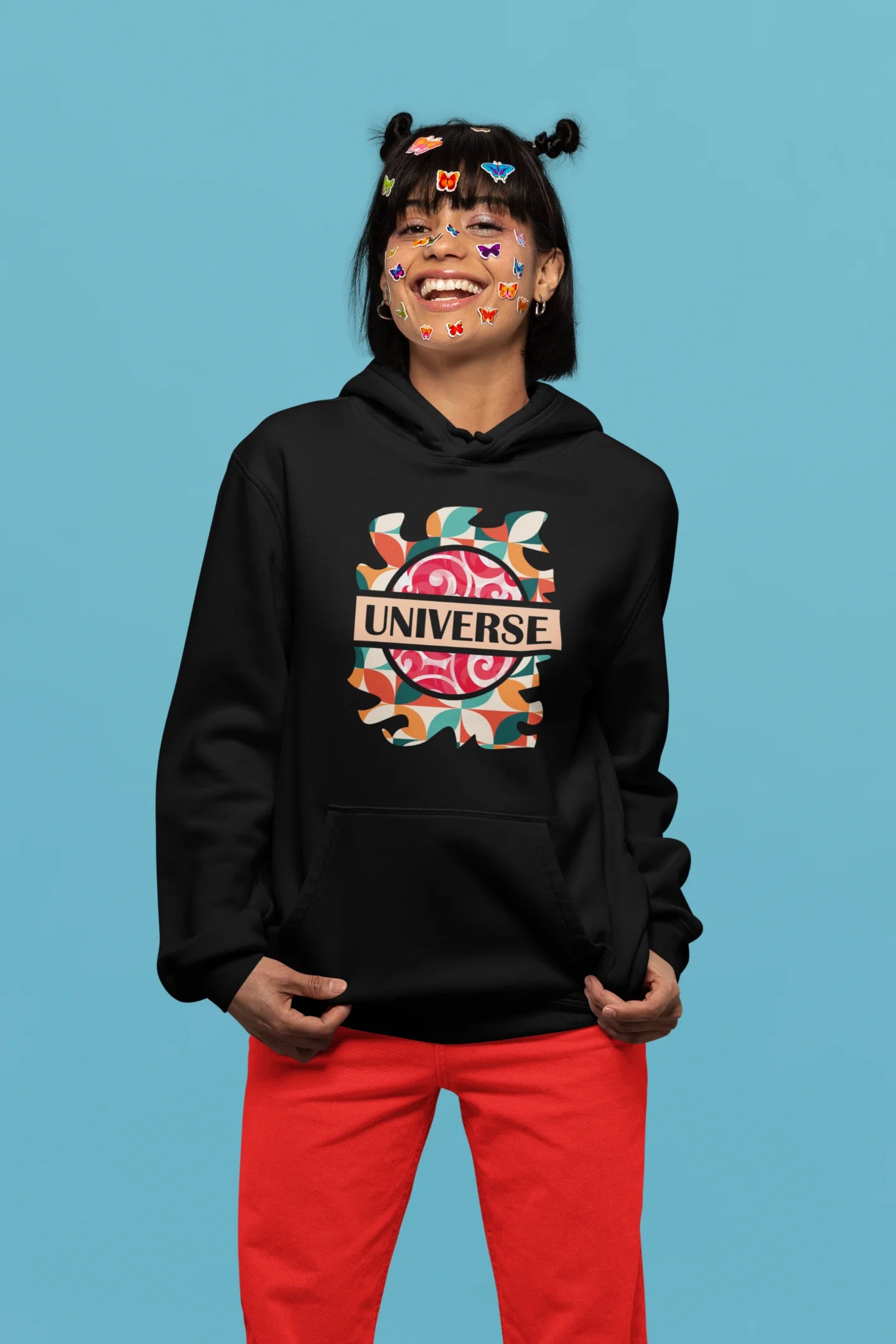 5th front view of a female model wearing an black hoodie with a cosmic Universe design inspired by Coldplay.