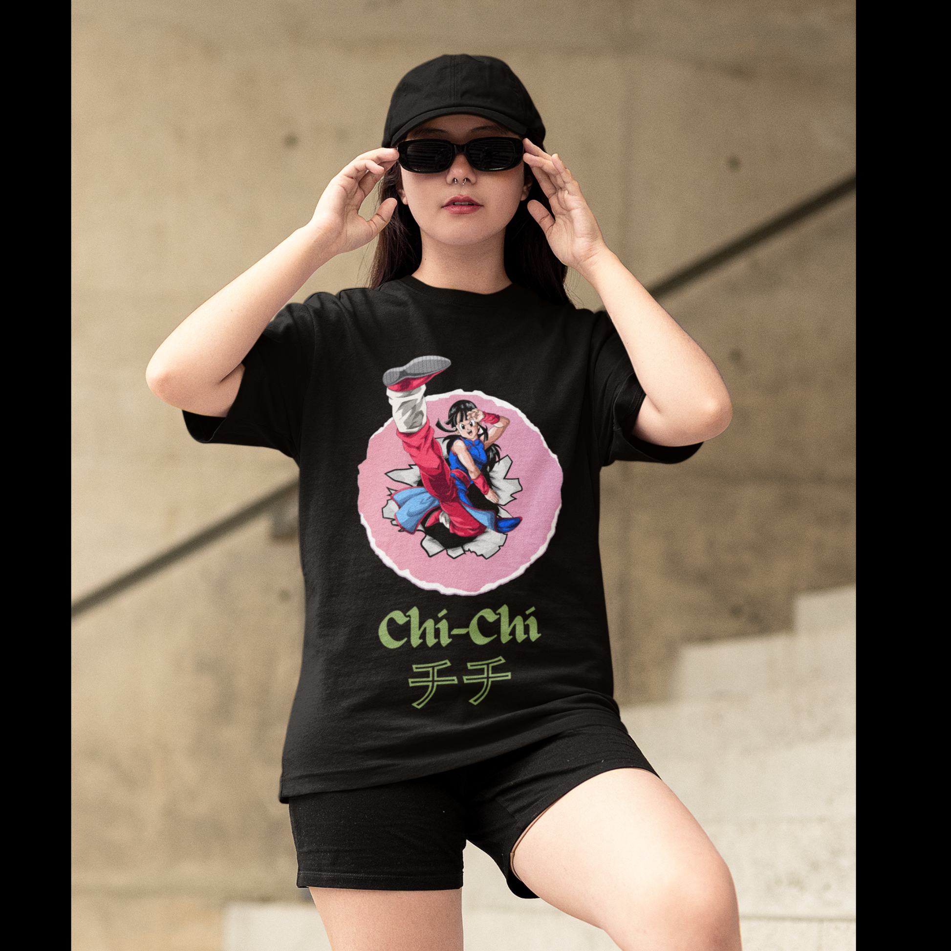 3rd front view of a female model wearing a black oversized t-shirt featuring Chi-Chi from Dragon Ball Z with the text "Chi-Chi."