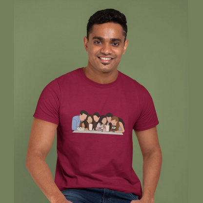 Front view of a male model wearing a maroon casual tee with Friends TV show inspired design featuring the central perk crew.