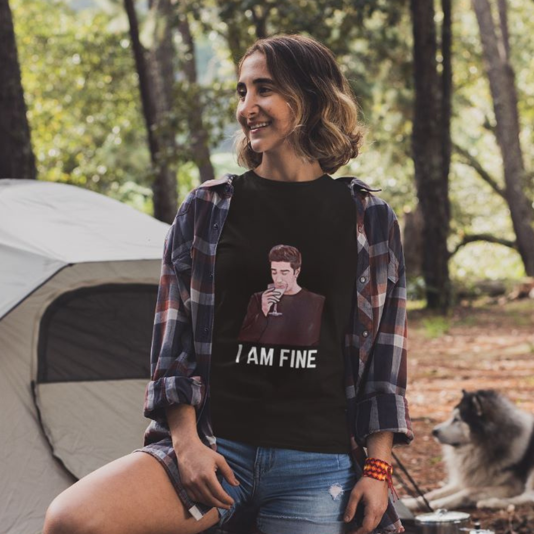 Front view of female model wearing a black casual t-shirt with F.R.I.E.N.D.S series inspired designs, embodying Ross's famous catchphrase 'I Am Fine'