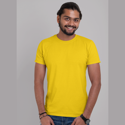 Front view of a male model wearing a yellow oversized, premium quality, pure cotton t-shirt.