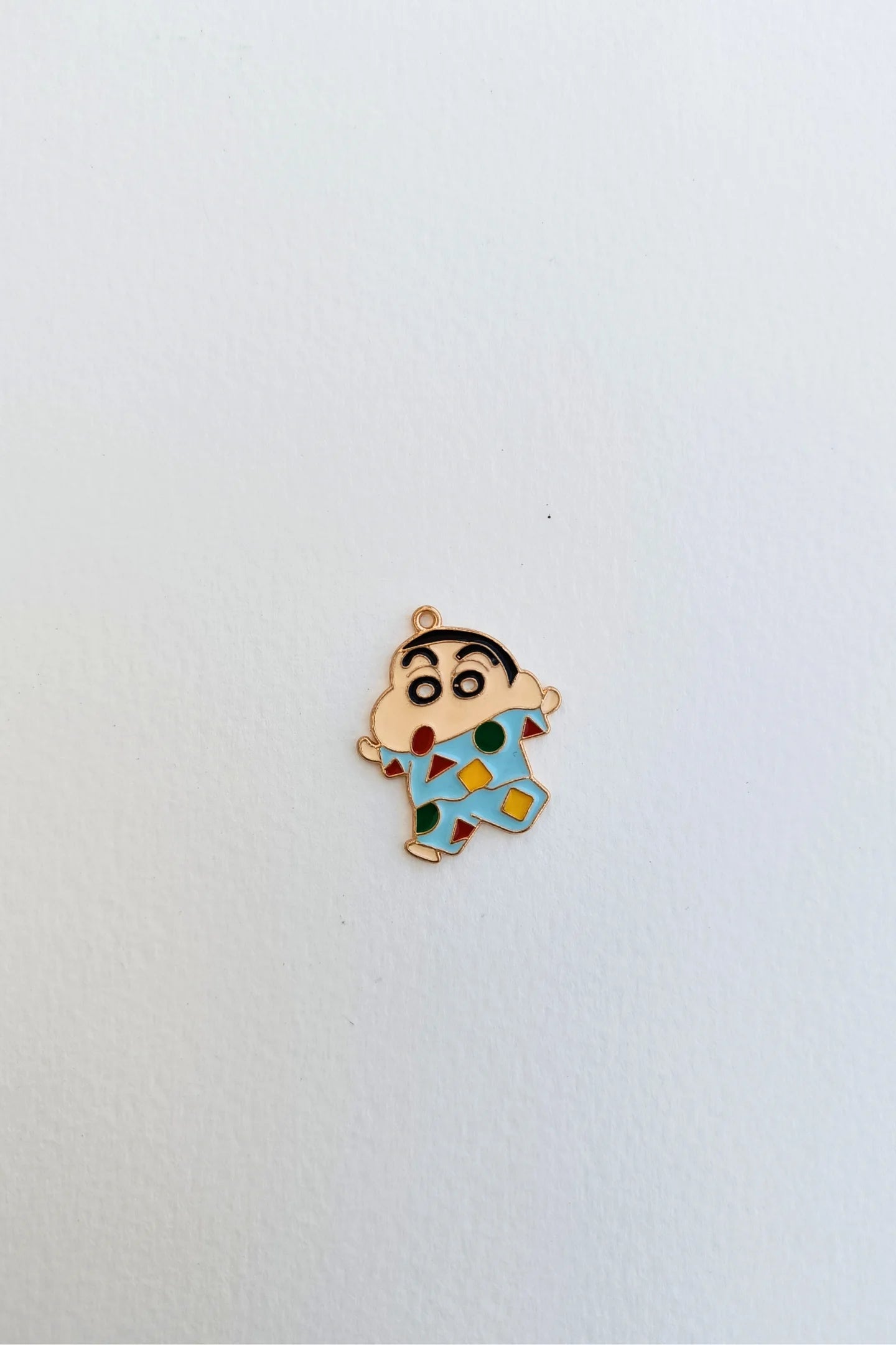 Fifth view of a charm featuring Shinchan waking up in the morning.