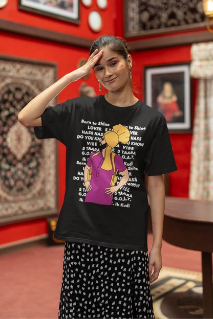 Fourth image of a female model wearing a black oversized t-shirt with a Diljit Dosanjh portrait on a t-shirt with his album titles written in the background.