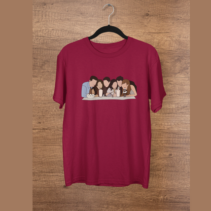 Front view of a maroon casual tee with Friends TV show inspired design featuring the central perk crew.
