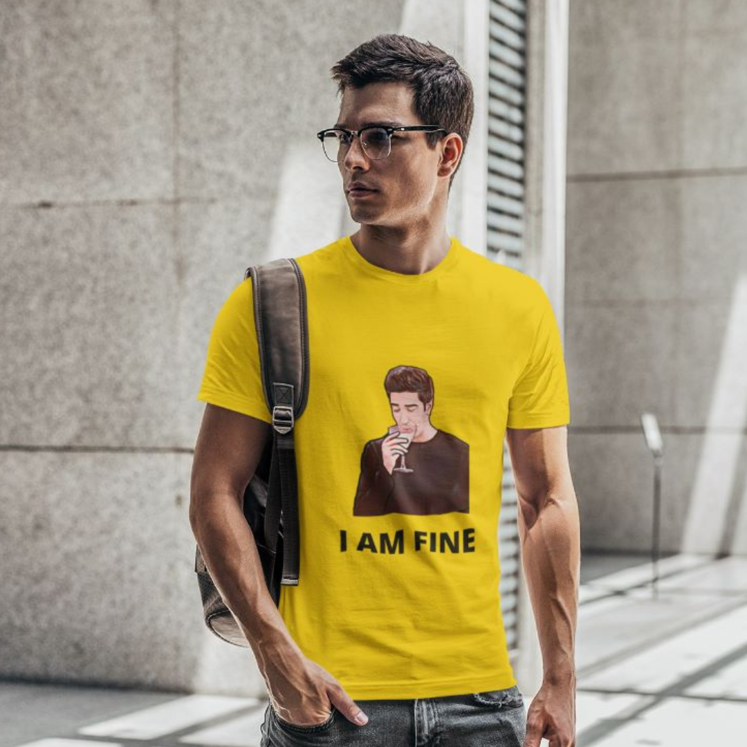 Front view of male model wearing a yellow casual t-shirt with F.R.I.E.N.D.S series inspired designs, embodying Ross's famous catchphrase 'I Am Fine'