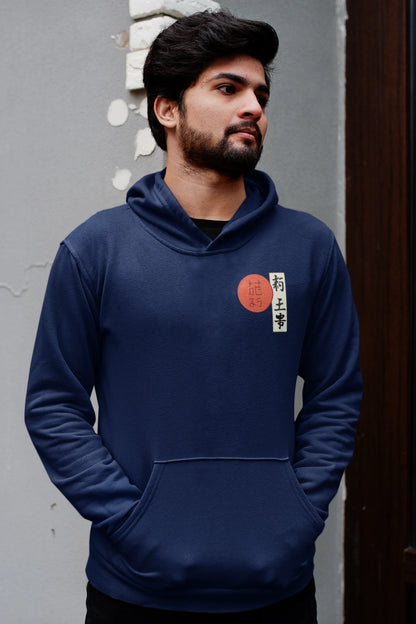 First front view of a male model wearing a navy blue hoodie with a design of a wolf surveying a Japanese landscape.