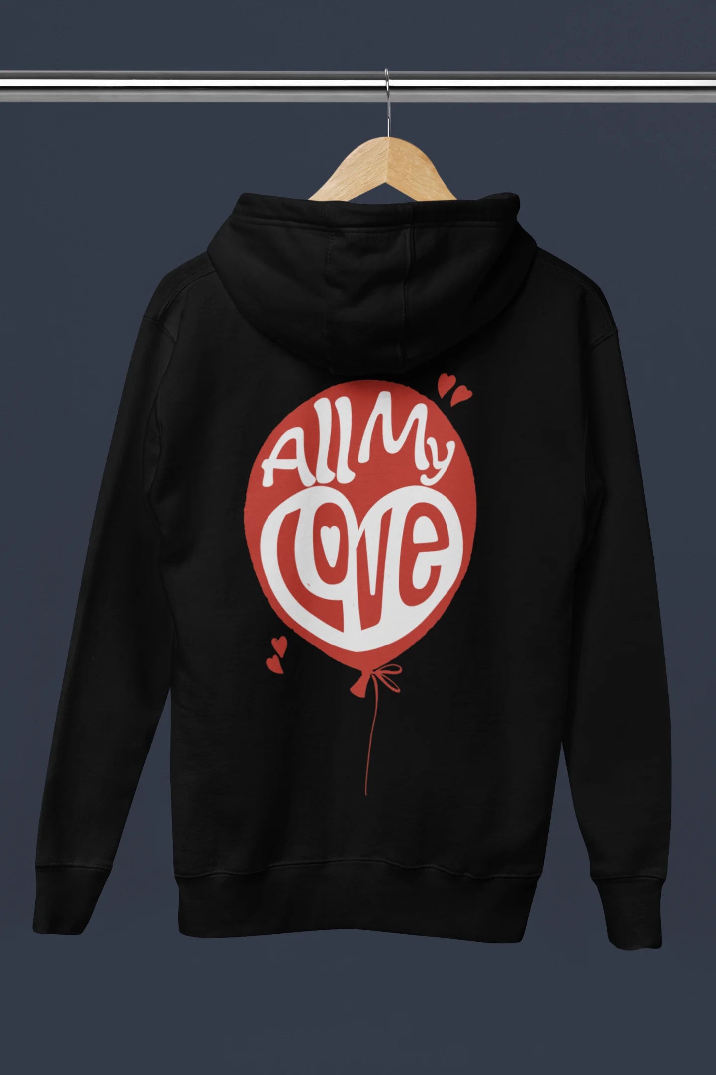 Back view of a black hoodie with a heart design and the text "All My Love".