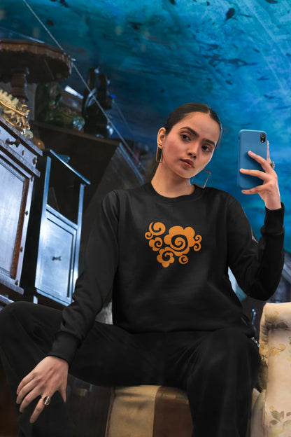 First front view of a female model wearing a black sweatshirt featuring "Bindass" in a stylish Hindi font.