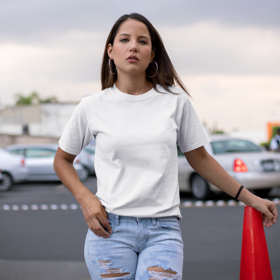 Front view of a female model wearing a off-white oversized, premium quality, pure cotton t-shirt.