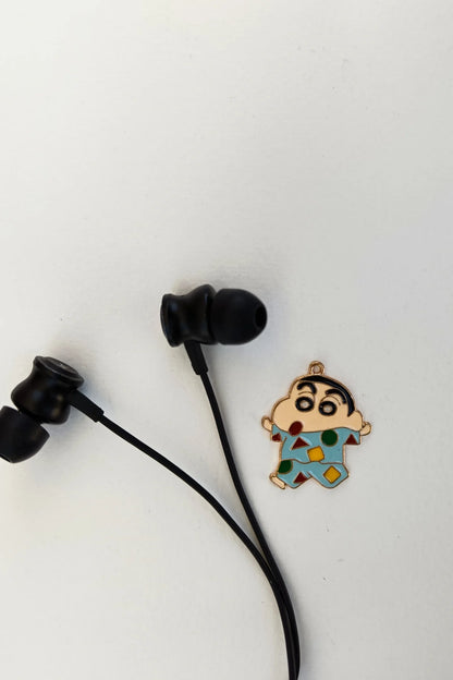 Second view of a charm featuring Shinchan waking up in the morning.