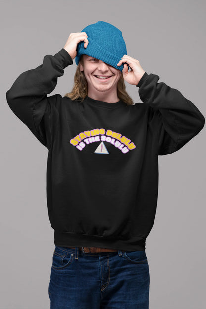 2nd front view of male model wearing a black sweatshirt with the hilarious message "Stay Delulu" in a bold design. Ideal for those who love trendy slang and lighthearted humor.