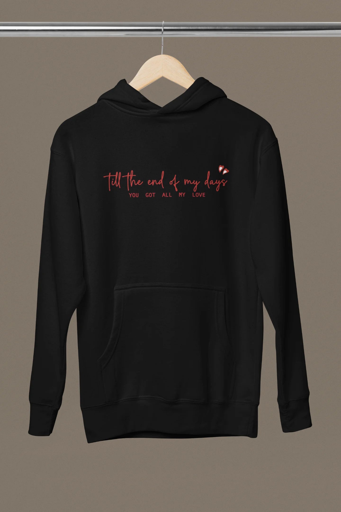Front view of a black hoodie with a heart design and the text "All My Love".