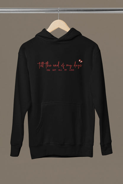 Front view of a black hoodie with a heart design and the text "All My Love".