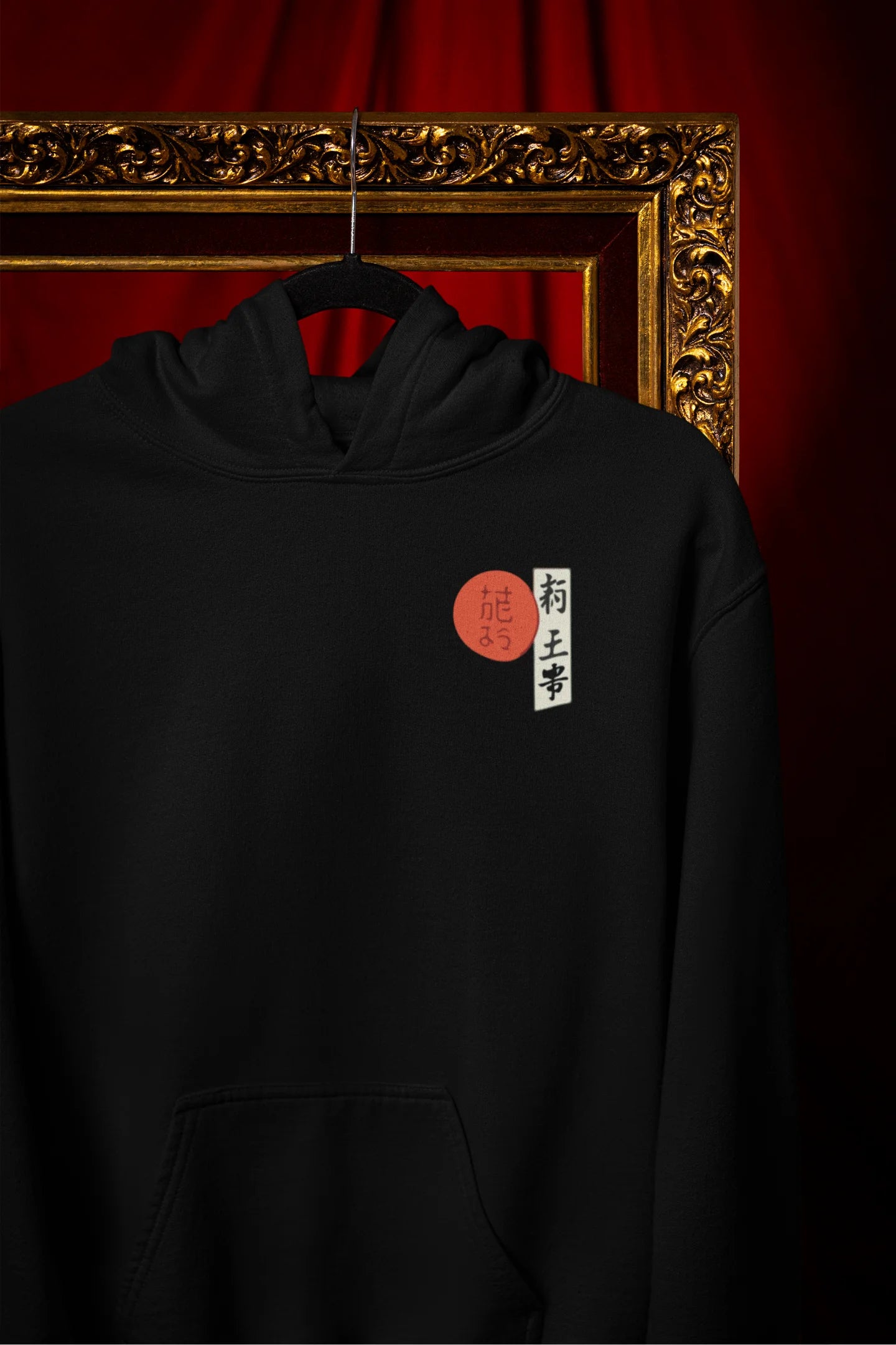 Front view of a black hoodie with a design of a wolf surveying a Japanese landscape.