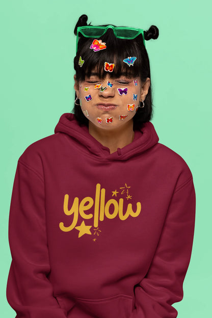 6th front view of a female model wearing a maroon hoodie with the "Yellow" album artwork by Coldplay.